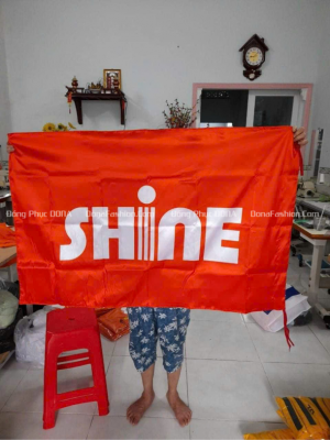 May in cờ công ty SHINE