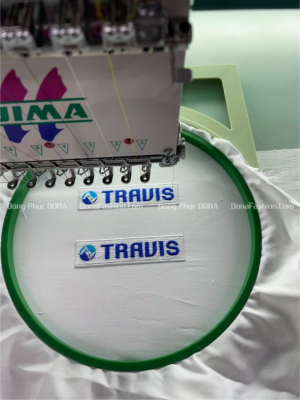 Thêu logo đồng phục TRAVIS 