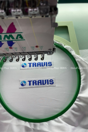 Thêu logo đồng phục TRAVIS 