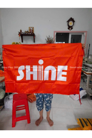 May in cờ công ty SHINE